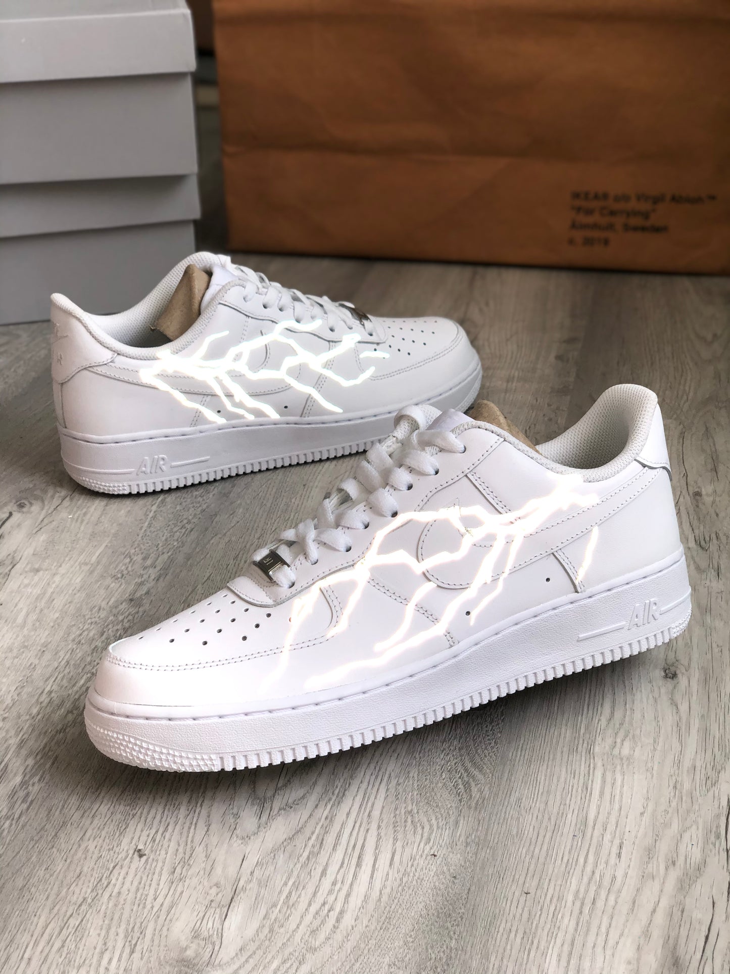 Hand-painted custom sneakers with reflective design by VK Customs