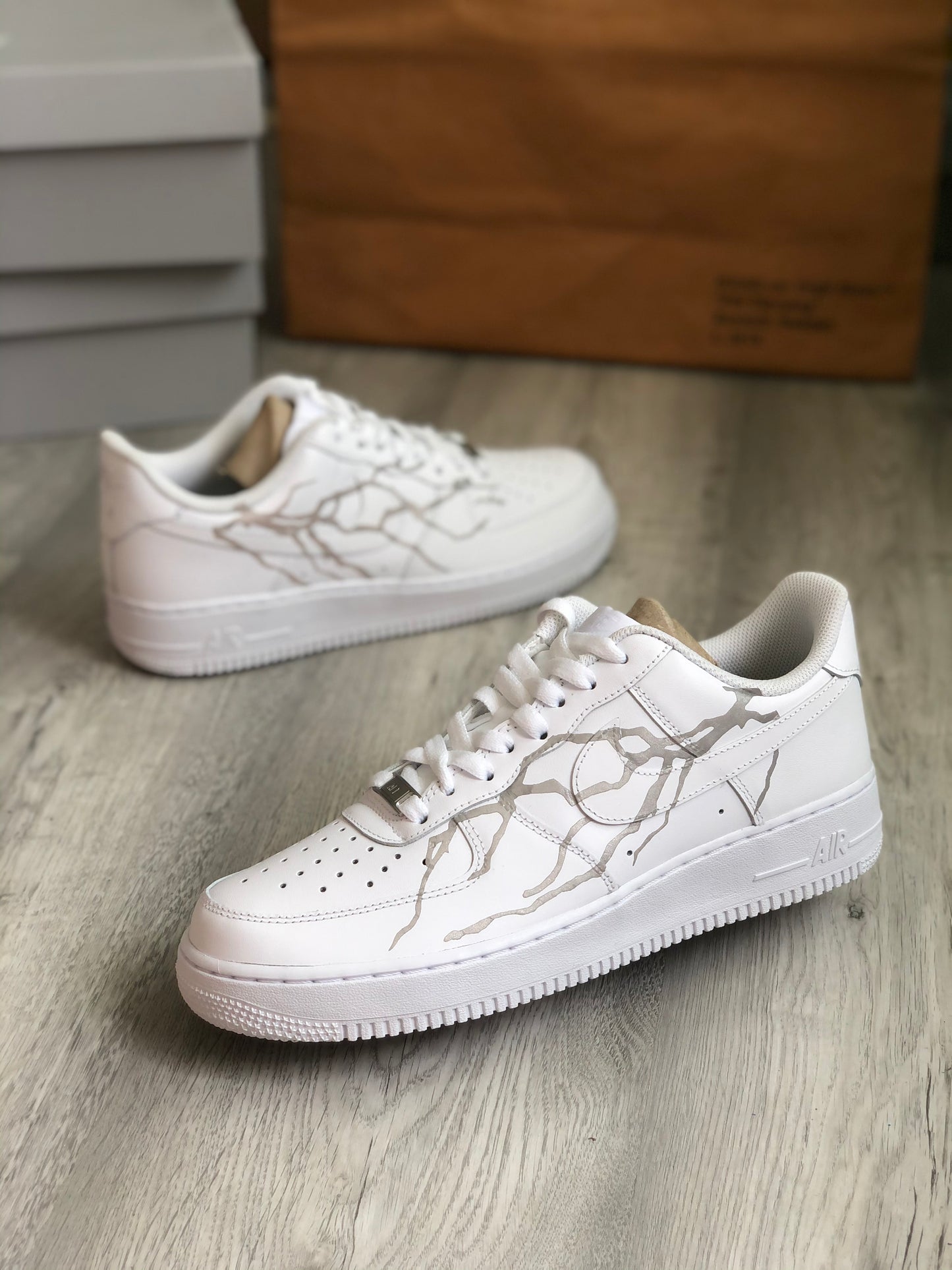 Hand-painted custom sneakers with reflective design by VK Customs