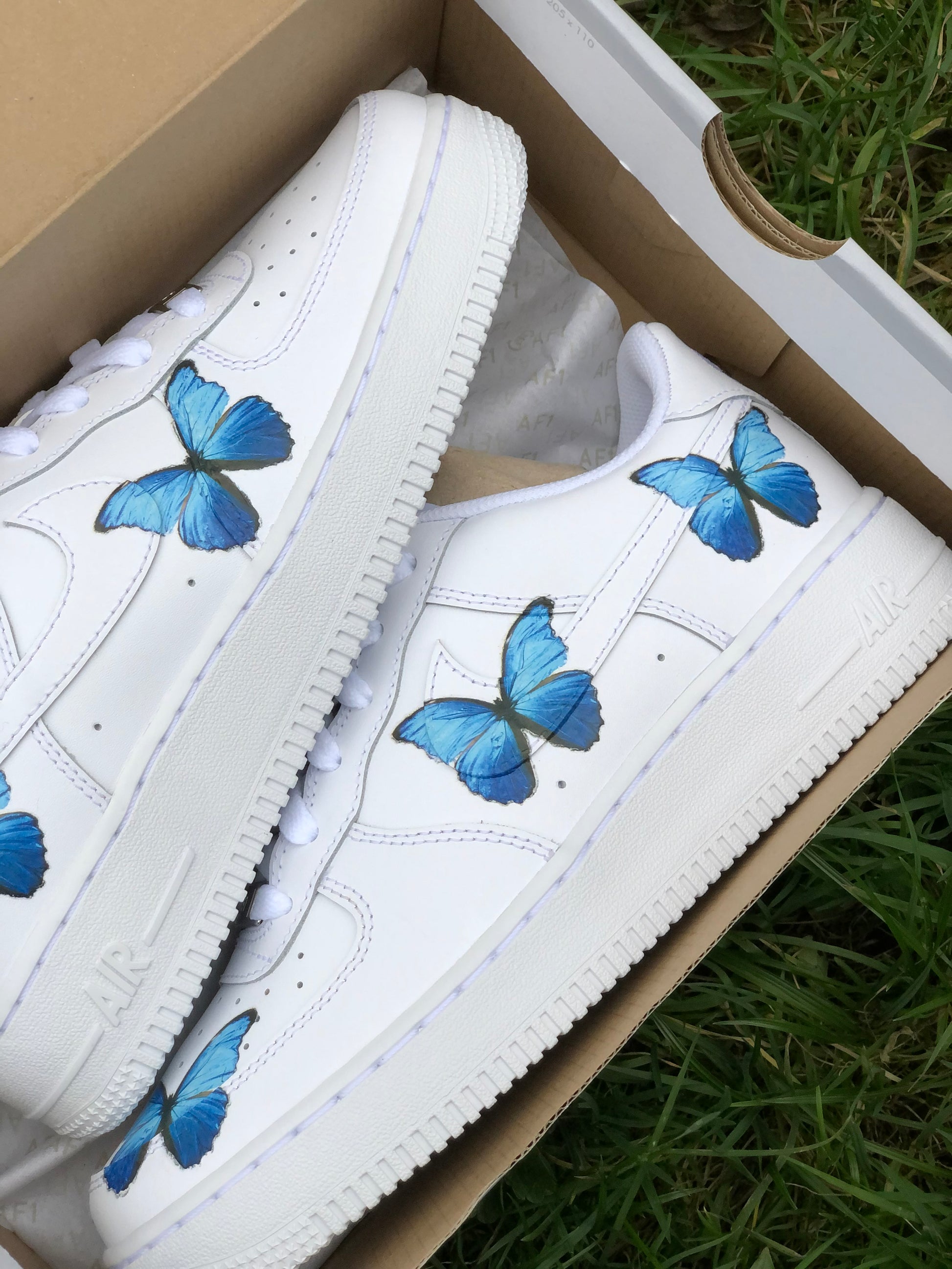 Hand-painted custom sneakers with abstract design by VK Customs