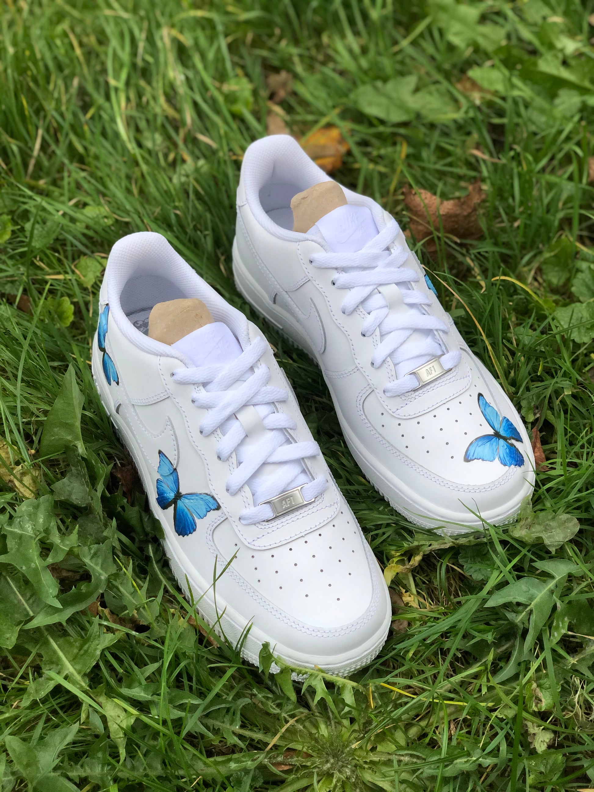 Hand-painted custom sneakers with abstract design by VK Customs