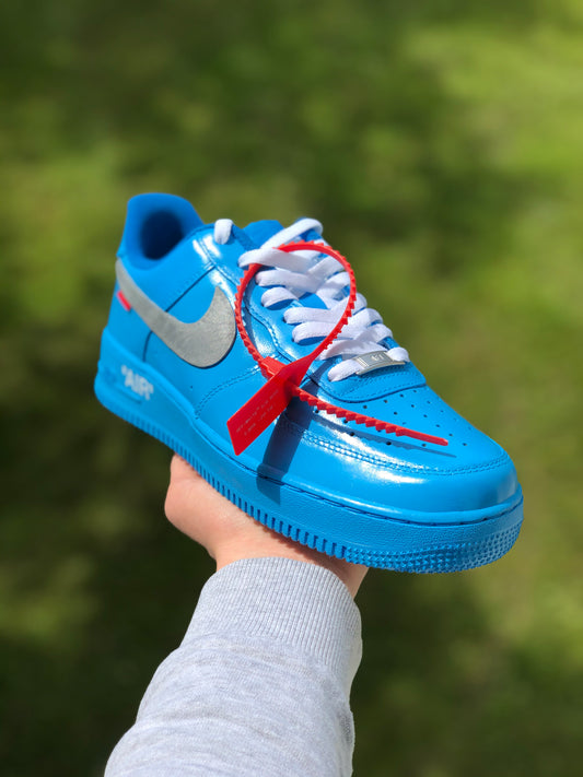 Hand-painted custom sneakers with abstract design by VK Customs