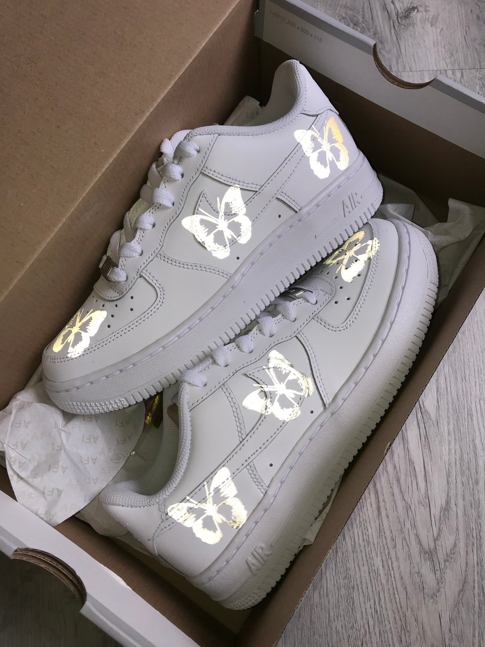 Hand-painted custom sneakers with abstract design by VK Customs