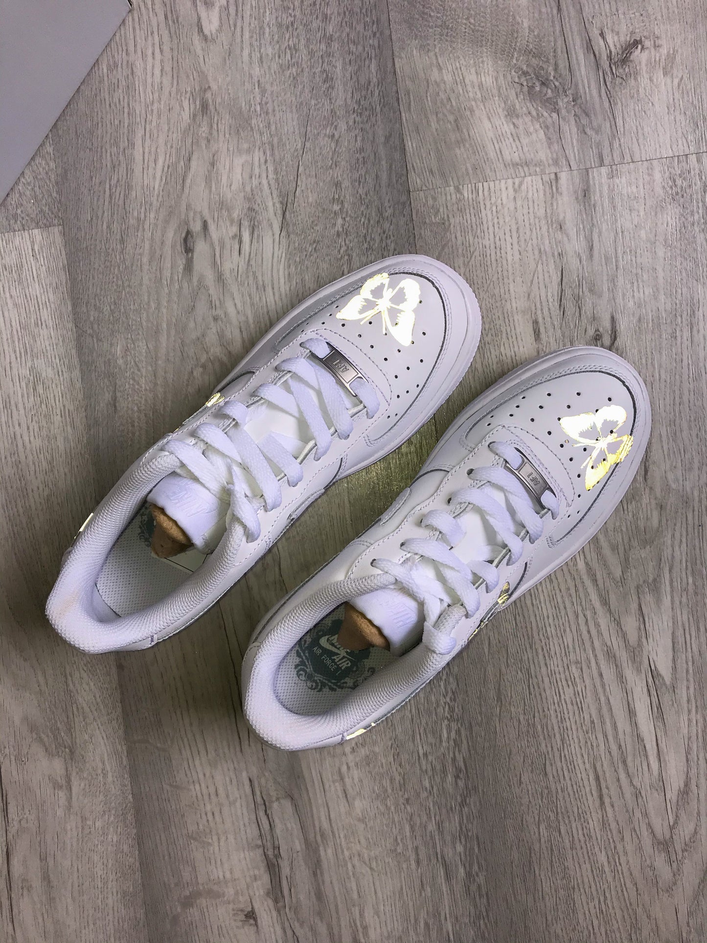 Hand-painted custom sneakers with abstract design by VK Customs